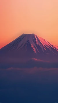 Majestic Stratovolcano at Dawn Above a Sea of Clouds