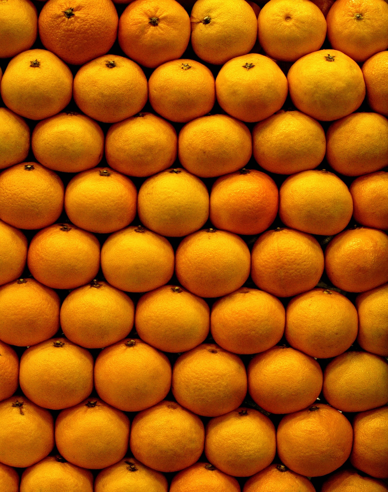 Viele orangen sind übereinander gestapelt (mandarine, frucht, naturkost, orange, essen)