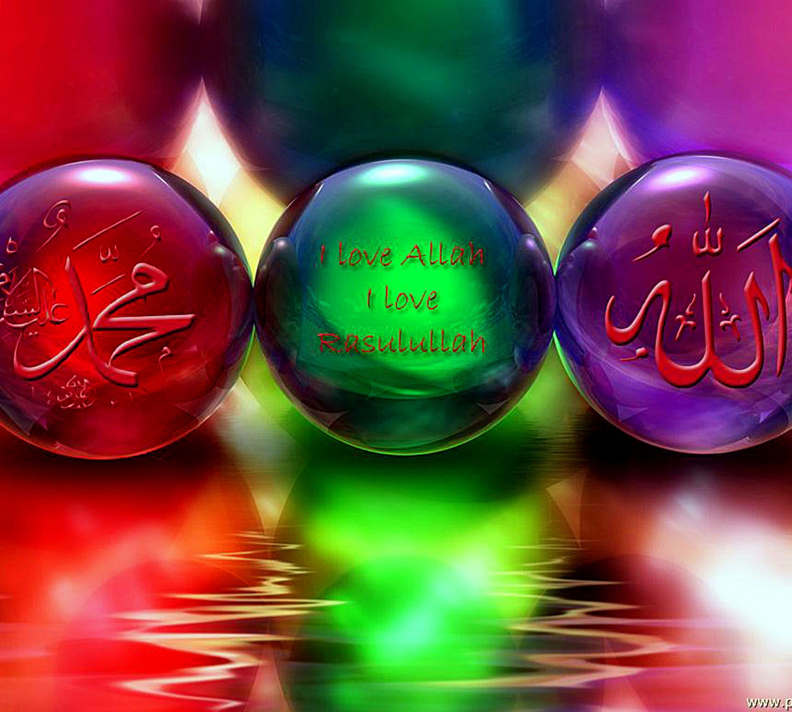 Three colorful glass balls with arabic writing on them (allah, mohamad)