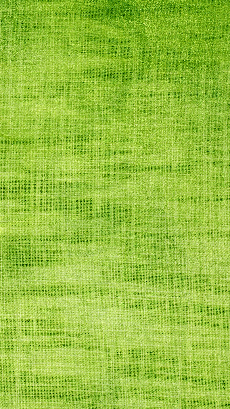 A close up of a green grass field with a single white bird (green, threads)