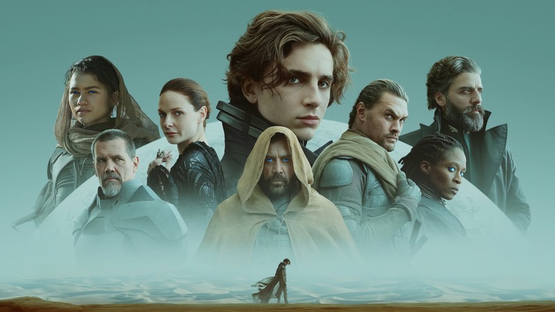 Группа людей стоит перед постером звездных войн (дюна, dune, фильм, актёры, персонажи)