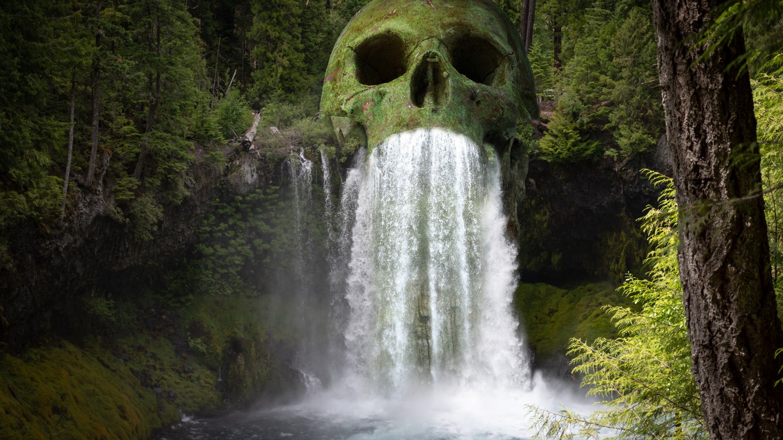 There is a large skull head in the middle of a waterfall (curtain, waterfall, design, art, illustration)