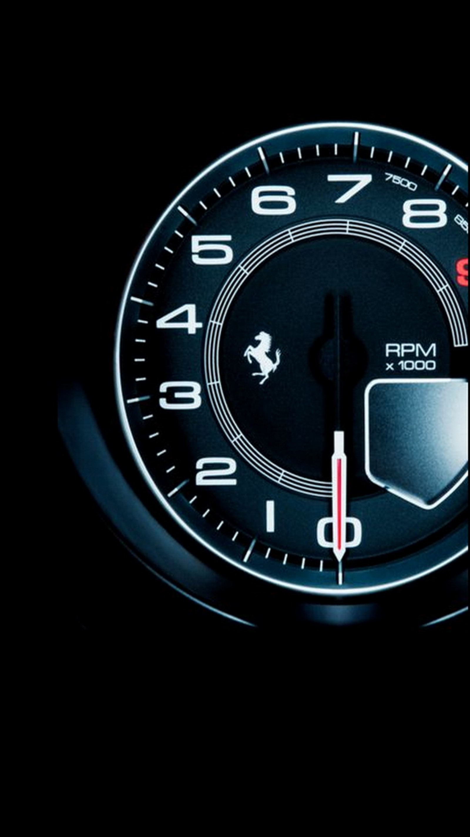 A close up of a car dashboard with a clock and a speedometer (ferrari, radar)