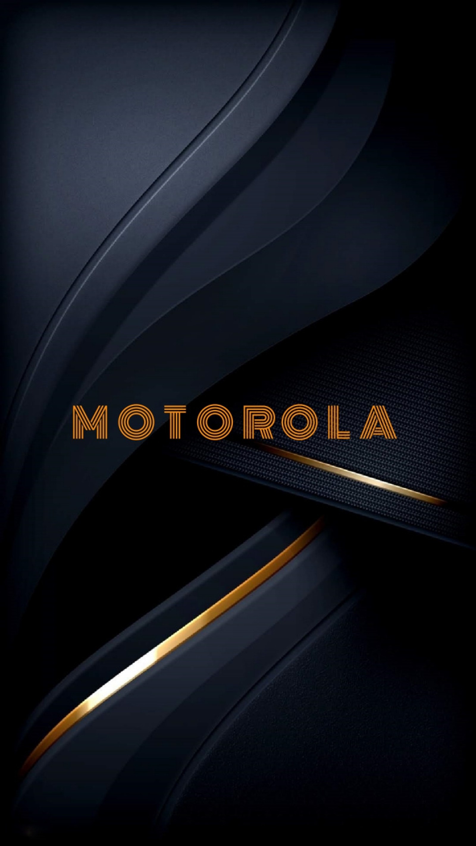 A close up of a motorcycle with a black background and gold lettering (motorola, black, shine, dark, copper)