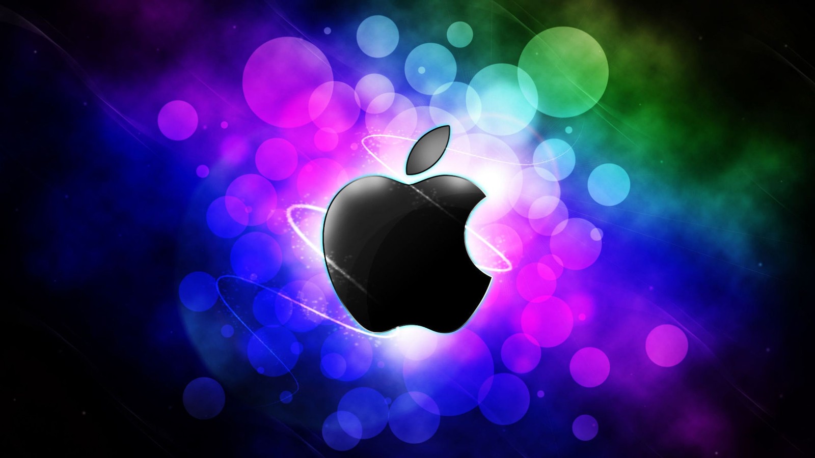 Un logo de apple sobre un fondo colorido con luces borrosas (manzana, ligero, planta, corazón, fruta)