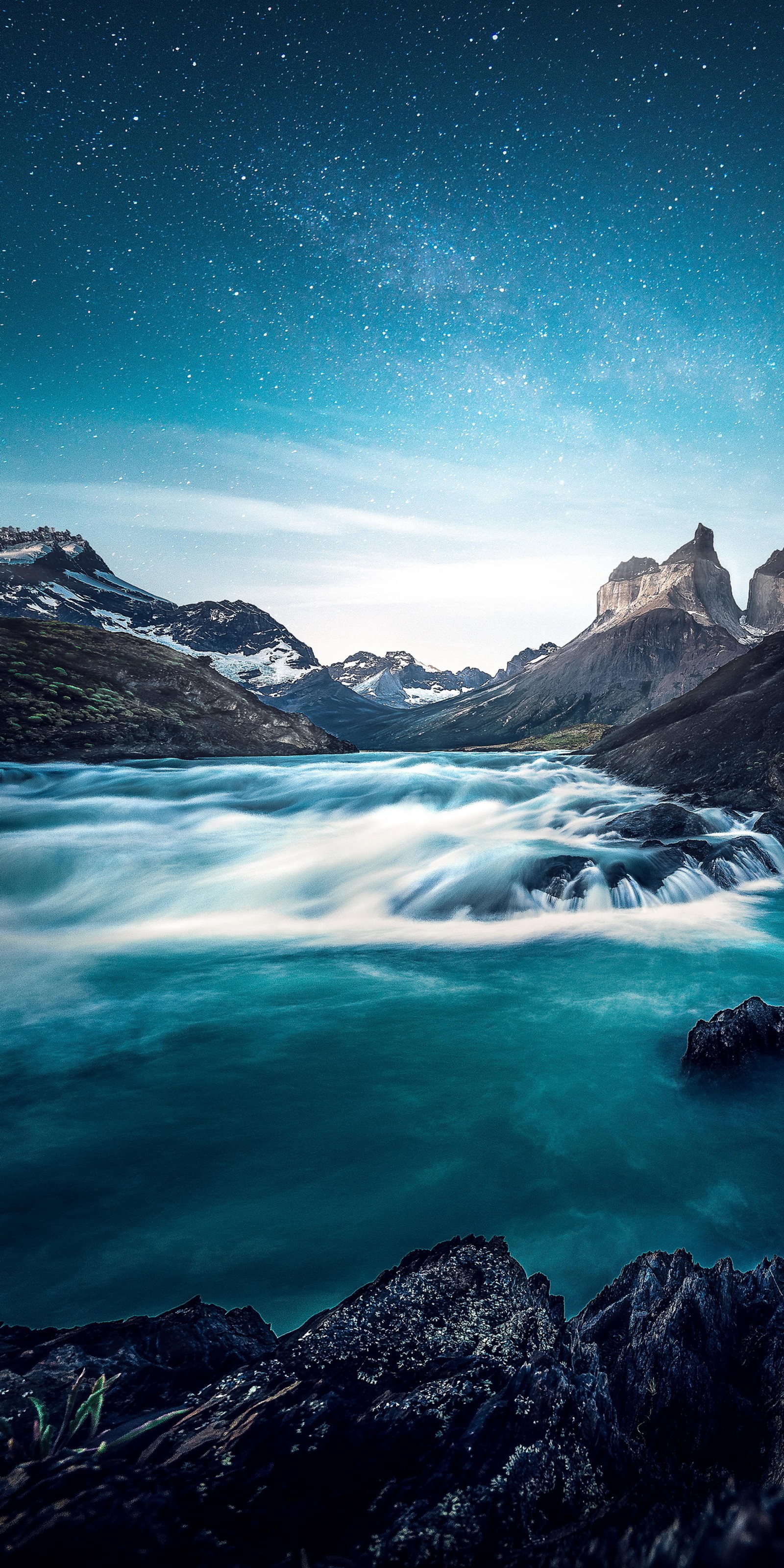 There is a long exposure of a mountain lake with a star filled sky (torres del paine national park, lake peho, national park, park, grand teton national park)