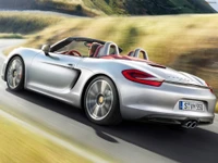 Porsche Boxster S Cabriolet 2013 : Une Voiture de Sport Élégante en Mouvement