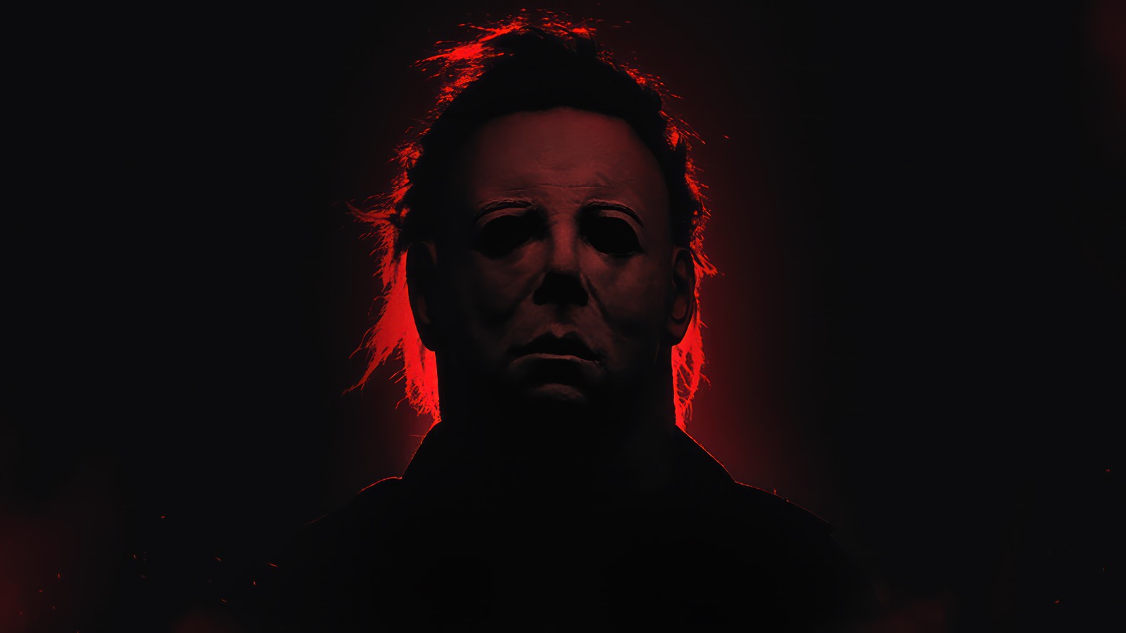 Un gros plan d'une personne avec un visage ensanglanté dans l'obscurité (michael myers, halloween, horreur, film)