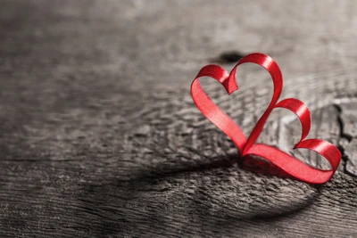 Intricately Twisted Red Hearts on a Rustic Surface for Valentine's Day