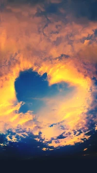 Heart-Shaped Cloud Against a Dramatic Sunset Sky