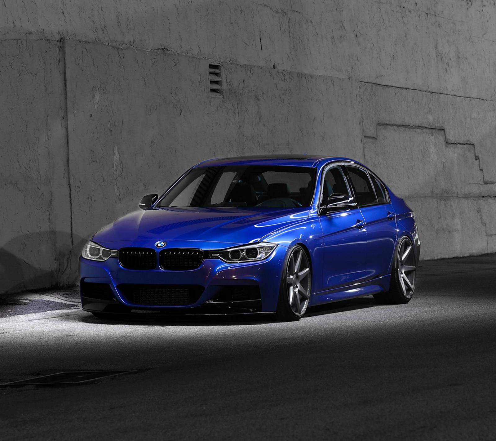 A close up of a blue bmw car parked in a parking lot (3 series, auto, bmw, car, f30)