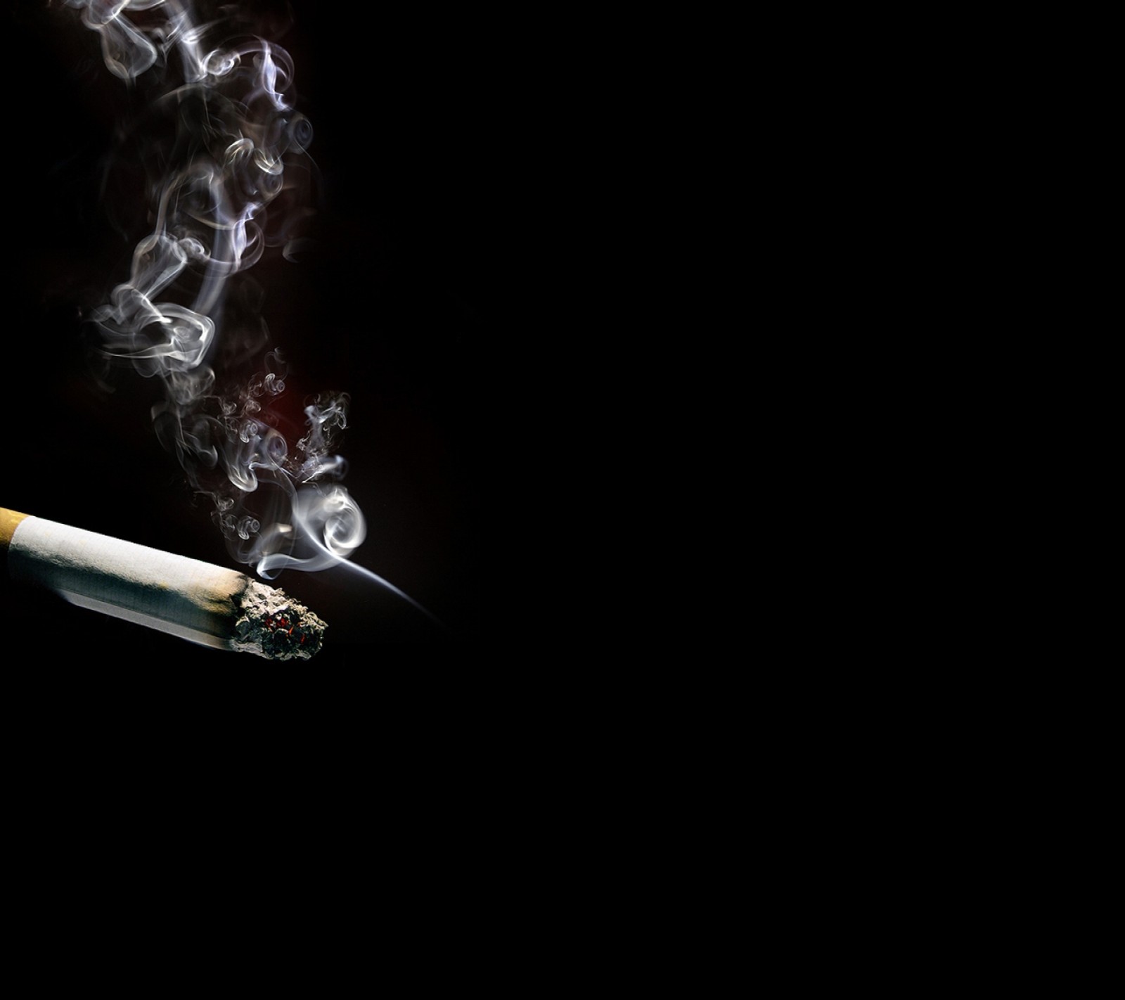 Smoke coming out of a cigarette with a black background (abstract, smoke)