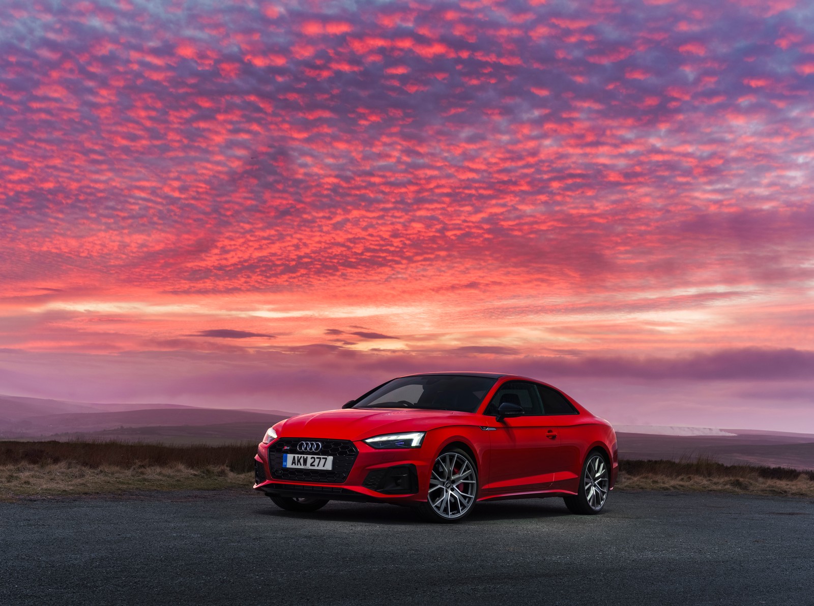 The audi rs3 is parked on a road with a sunset in the background (audi s5 coupe tdi, 2020, 5k, 8k, cars)