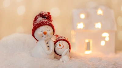 Familia de muñecos de nieve alegre en un país de invierno