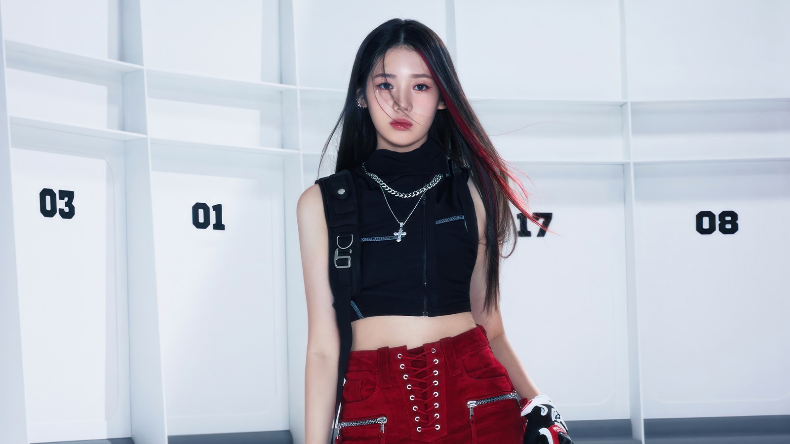 A woman in a black top and red skirt posing for a picture (babymonster, k pop, 베이비몬스터, kpop, girls)